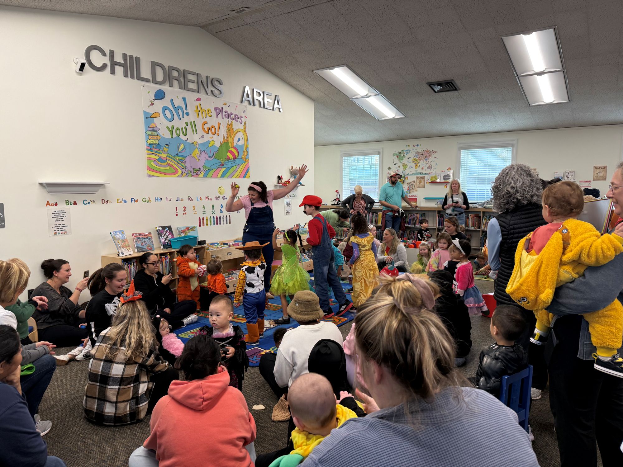 Librarian doing Storytime to a group of children