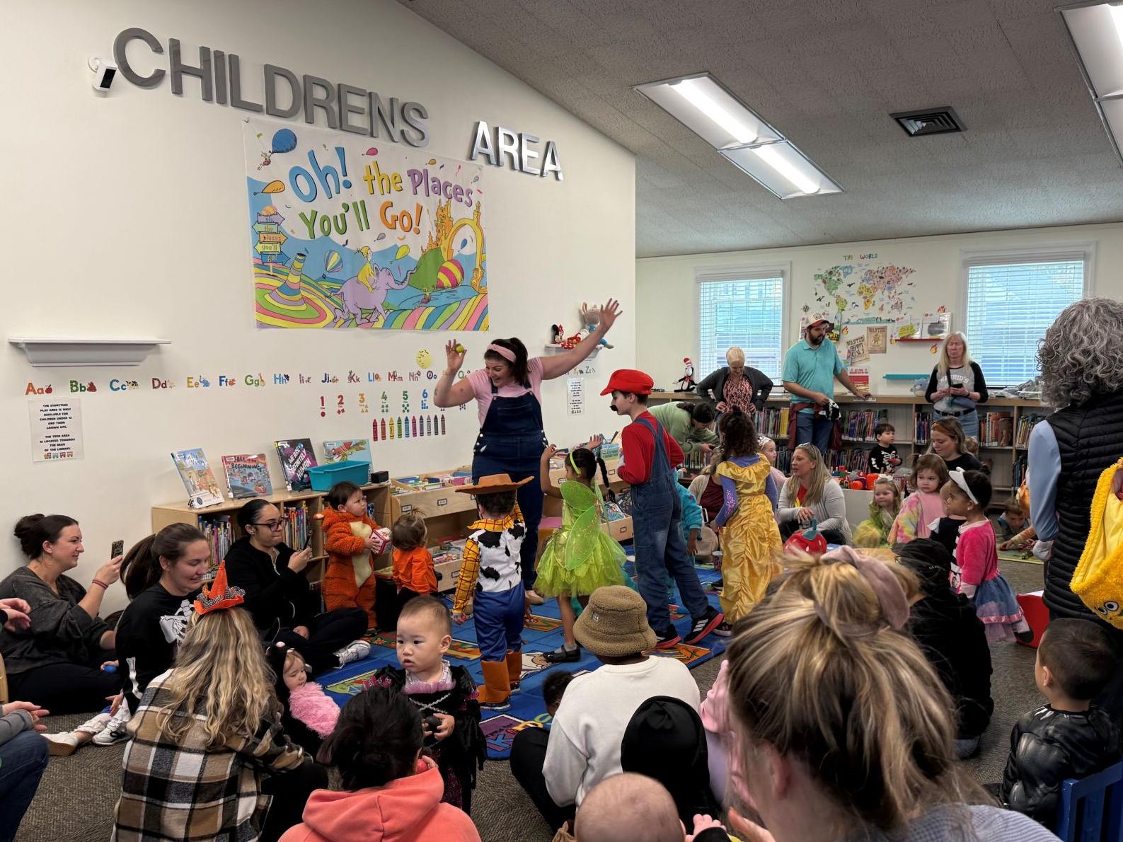 Librarian doing Storytime to a group of children
